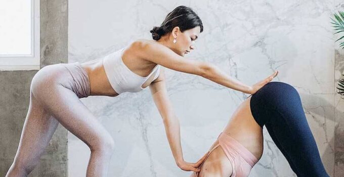2 woman yoga training